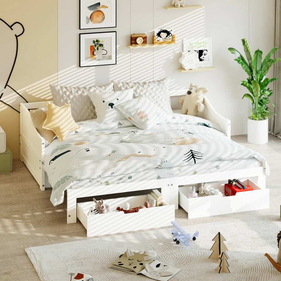 Lit banquette extensible en pin blanc avec tiroirs ouverts dans une chambre d'enfant